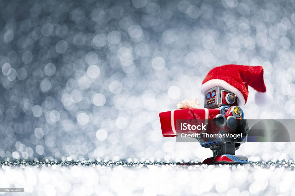 Retro Zinn Spielzeug santa Roboter hält Weihnachtsgeschenk - Lizenzfrei Roboter Stock-Foto