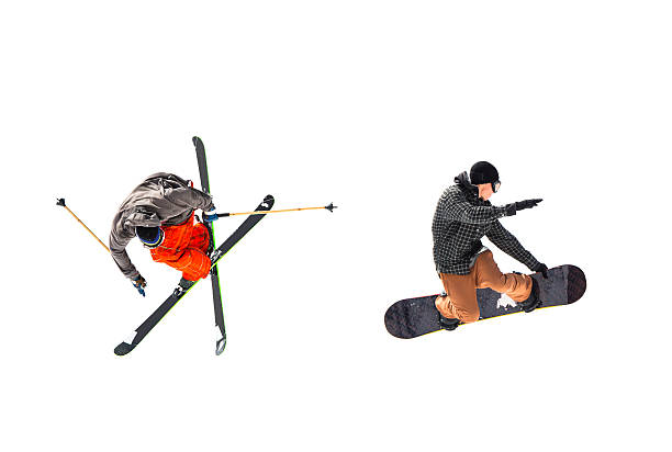 Free ride skier and snowboarder in mid air