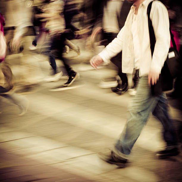 istock people crowd on zebra crossing street 187345722