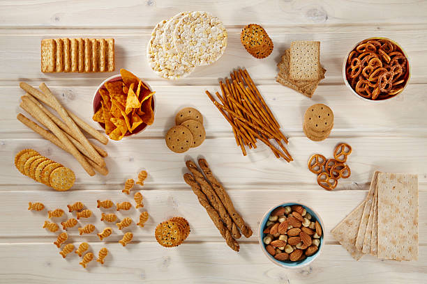 Snacks looking down on Processed foods Crackers stock pictures, royalty-free photos & images