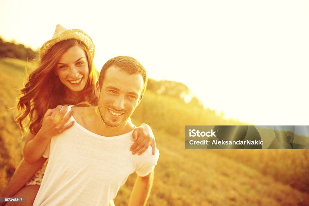 Smiling couple Smiling young couple enjoying a beautiful sunny day Adult Stock Photo