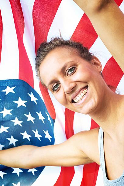 istock Young American Woman with his Flag 187345935
