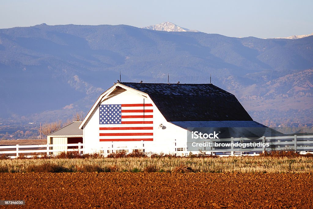 Barn With U.S. Flag An American flag is displayed on the side of a barn. American Flag Stock Photo