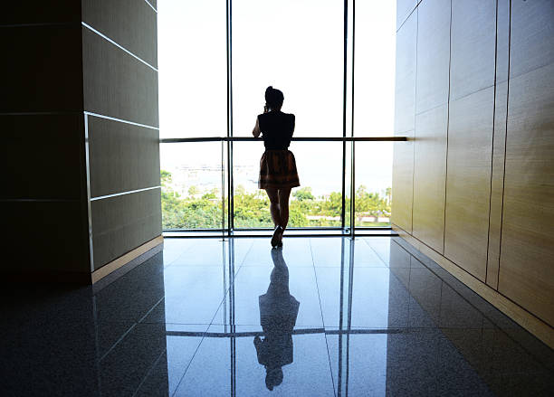 istock woman walking into the light 187346563