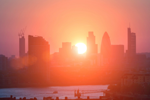 View of City of London's high rise architecture at sunset.