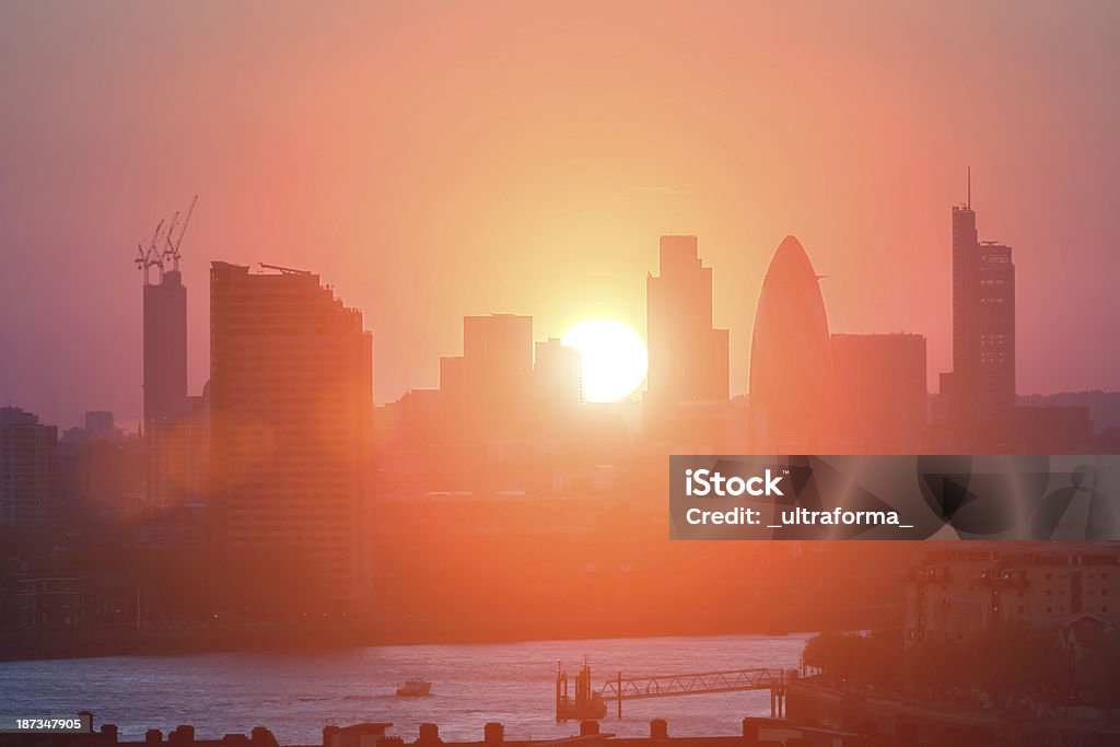 City of London silhouette View of City of London's high rise architecture at sunset. Heat Haze Stock Photo