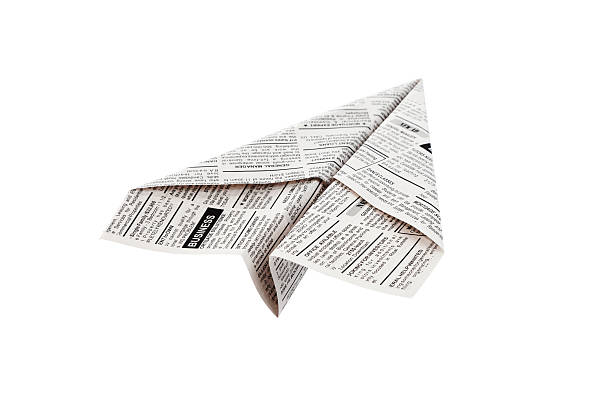 Newspaper Airplane stock photo