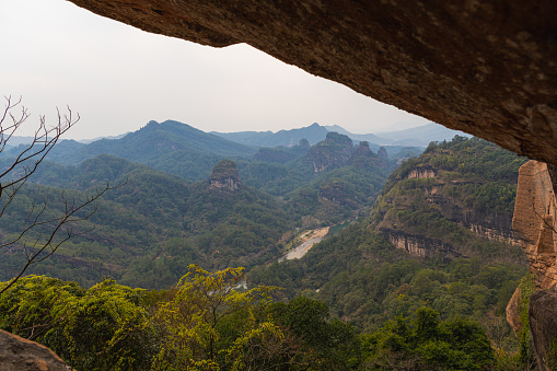 Uniquely shaped rocks around Wuyishan Scenic area, Fujian, China. The photo taken from Da Wang Peak, copy space for text