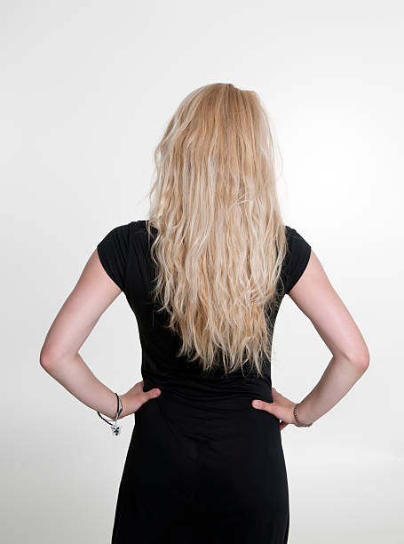 istock rear view of young woman 187351483