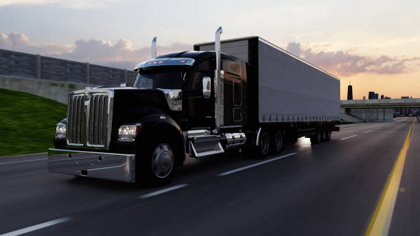 istock American style truck on freeway pulling load. Transportation theme. 3D illustration 1873516622