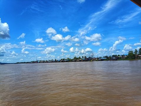 view of the Mahakam River with a blue sky background