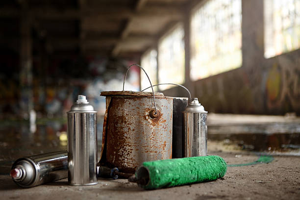 Spray Cans and Painting Graffiti Kit Left Over stock photo