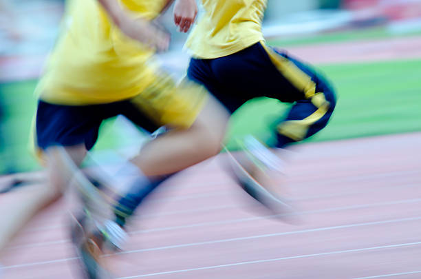 istock running child on sport track blurred motion 187353863