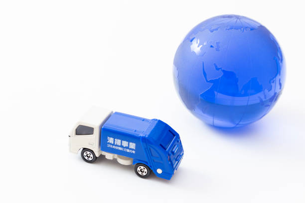 istock Garbage truck and the earth. 1873545107