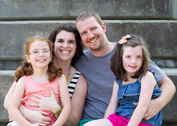 istock Family smiles together 187355148