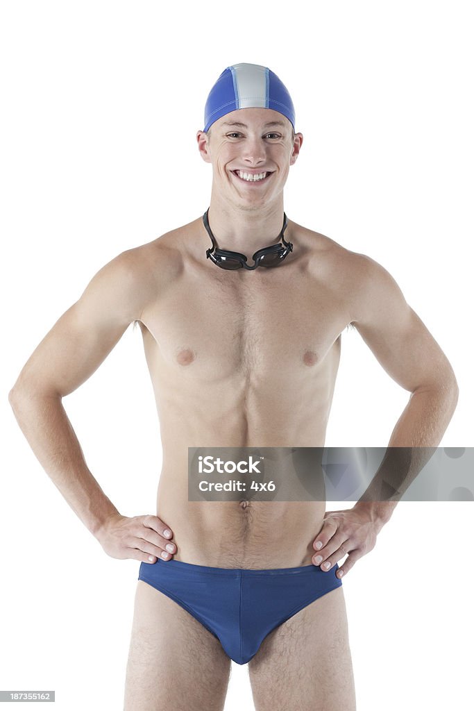 Pie sonriente hombre nadador - Foto de stock de 18-19 años libre de derechos