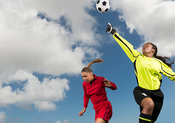 istock Young Women Playing Football 187355814