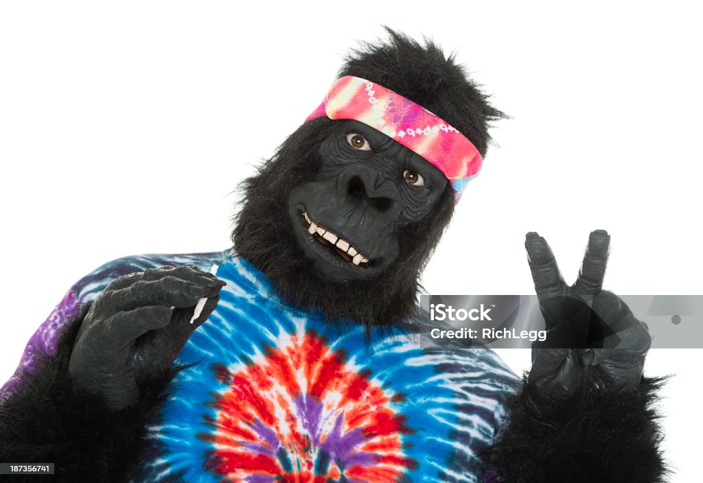 Gorilla Hippie A gorilla in a tie-dye shirt flashing the "peace" sign. Smoking - Activity Stock Photo