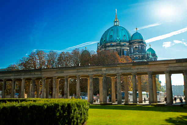istock Berliner Dom garden in the front and blue sky 187359078