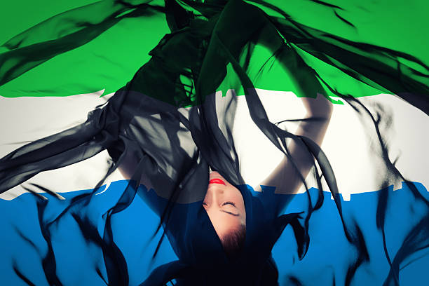 istock Young girl with Sierra Leonean Flag 187359682