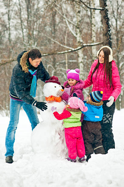 istock Family in a winter park 187360126