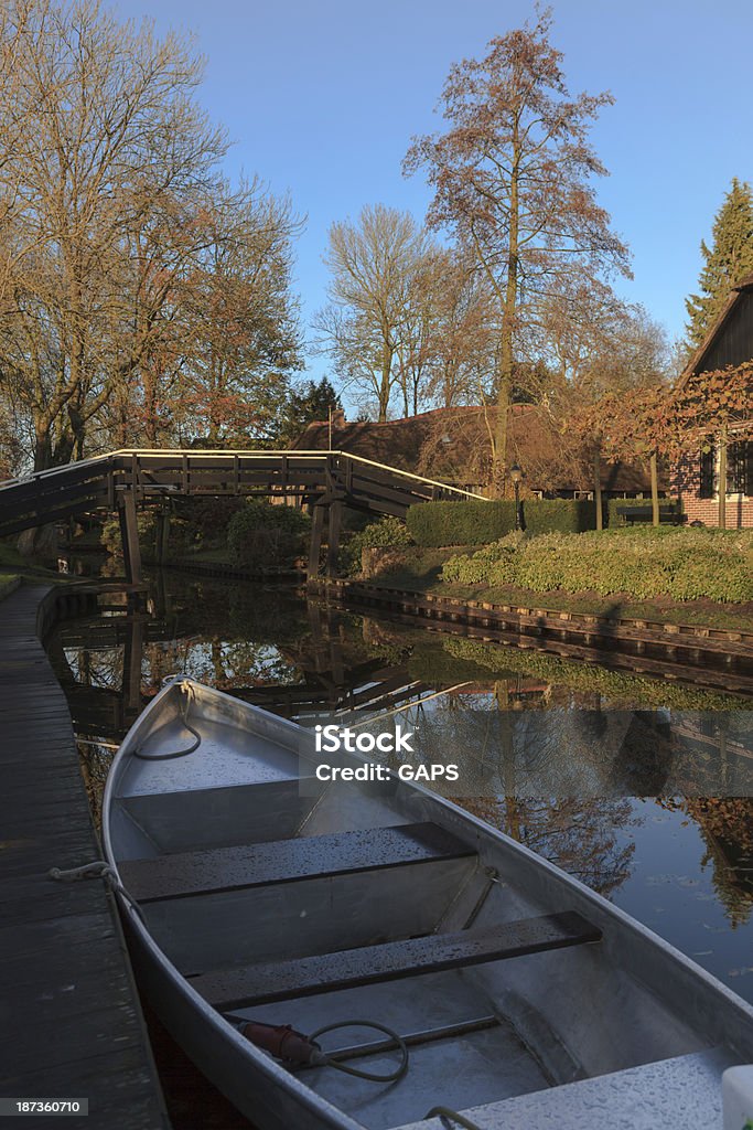 characteristic bridges and canals in Giethoorn characteristic bridges and canals in Giethoorn, a smal village in the Dutch province of Overijssel and known as 'Venice of the North'; Giethoorn, Netherlands Bridge - Built Structure Stock Photo