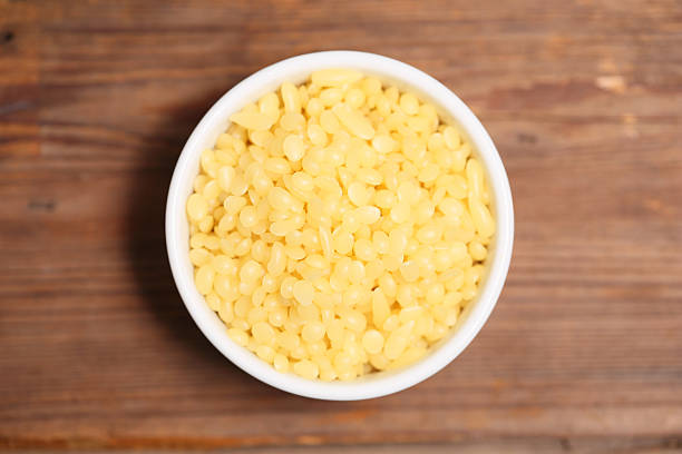 istock Natural Beeswax Pellets in Bowl 187362504