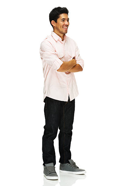 istock Smiling man standing with arms crossed 187362591