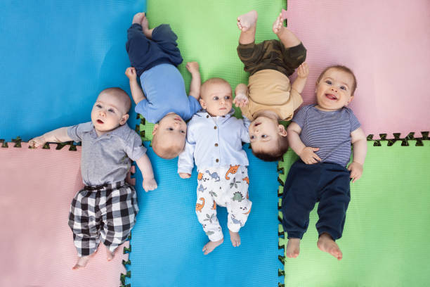 Portrait of five baby boys