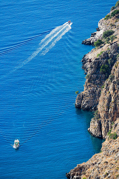 Boats at Butterfly valley at Fethiye / Turkey in Mediterranean sea.