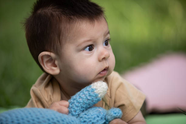 Latin american baby face down in the park - Buenos Aires - Argentina