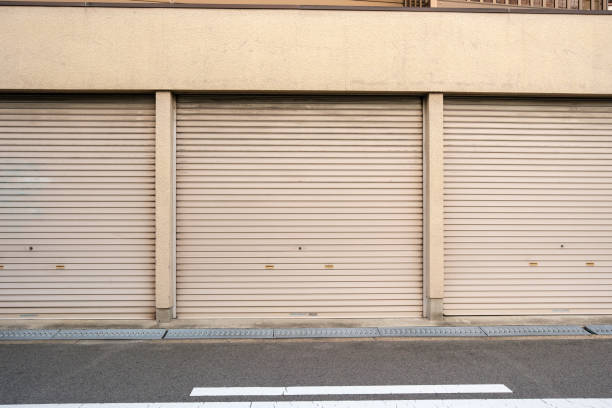 istock Close-up on three garage doors 1873643228