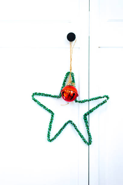 Christmas Ornaments (Star and Bell) on Closet Door