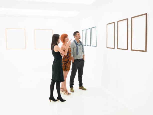istock group of people contemplating artworks 187368281