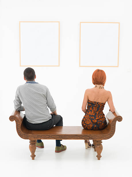 istock couple contemplating art 187368541