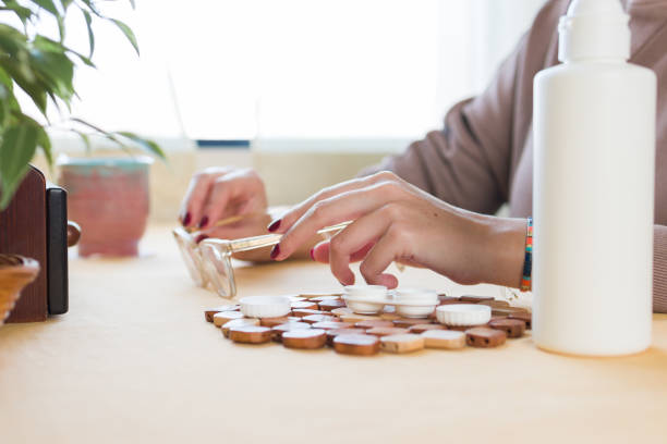 istock unrecognizable woman with vision problem changing her glasses for contact lenses 1873696115