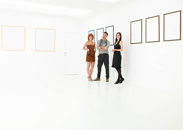 istock group of tourists in art gallery 187371794