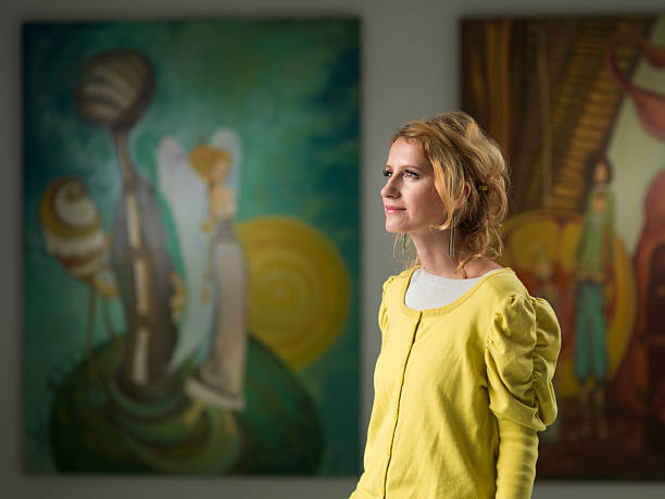 istock woman visiting art gallery 187372218