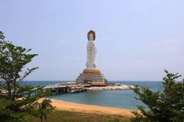 Sanya City, China - April 2, 2019: Guanyin sculpture on the sea in Nanshan tourist area, Sanya City, Hainan Province, China