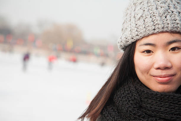 istock Young woman ice skating portrait, Beijing 187373202