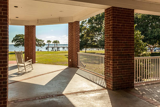 View from the Casino Porch A view from the Casino porch on St. Simons Island, of Neptune Park and the pier beyond saint simons island photos stock pictures, royalty-free photos & images