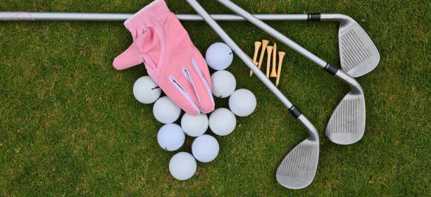 istock Golf equipment on green grass on golf course 1873785629