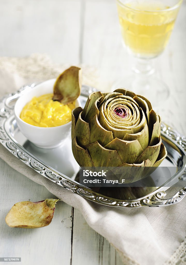 Artichoke with Homemade Aioli Artichoke Served with Homemade Aioli and Glass of White Wine Artichoke Stock Photo