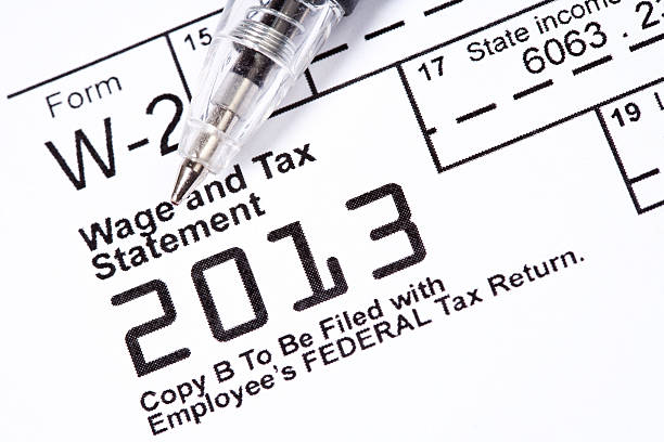 istock A pen left on top of a wage and tax statement 187382619