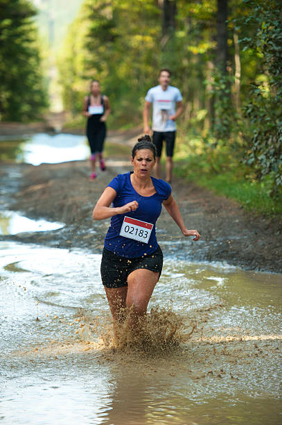 istock Woman Mud Racing 187382886
