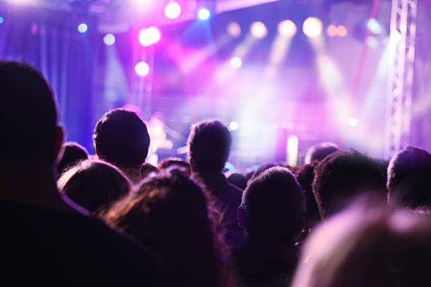 istock Crowded audience attending a rock concert 187385887