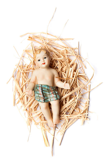 istock Baby Jesus Lying on Bed of Hay 187386199