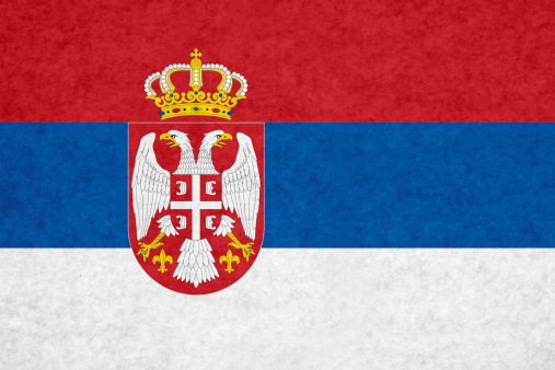 Serbian flag on mottled paper.