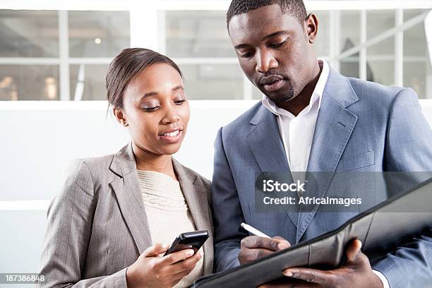 Work Colleagues Having A Business Discussion Stock Photo - Download Image Now - Business Person, Discussion, Two People