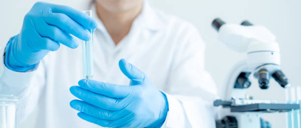 istock Scientist analyze biochemical sample in advanced scientific laboratory. Medical professional check chemical mix microbiological developmental of viral. Biotechnology research in science lab. cosmetic 1873875445